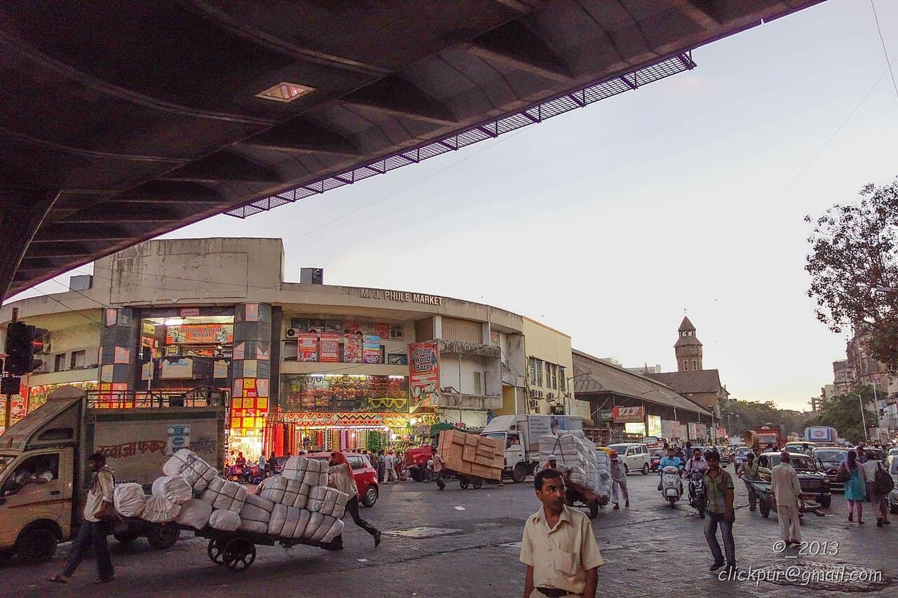 Porters and handcarts outside Mahatma Jyotiba Phule Market, Mumbai